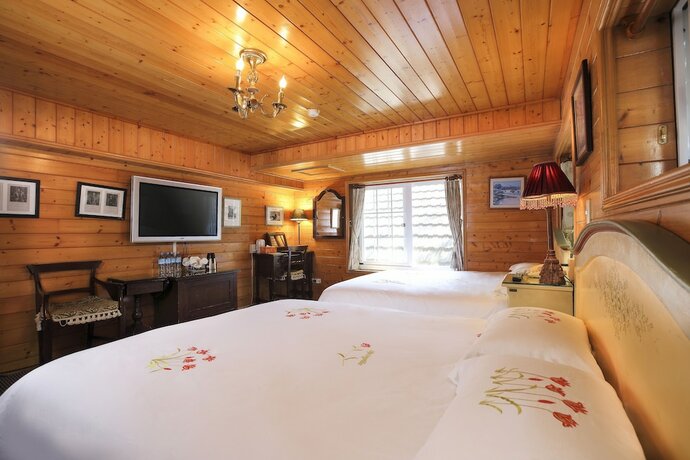 Imagen de la habitación del Hotel Cingjing Hanging Garden. Foto 15
