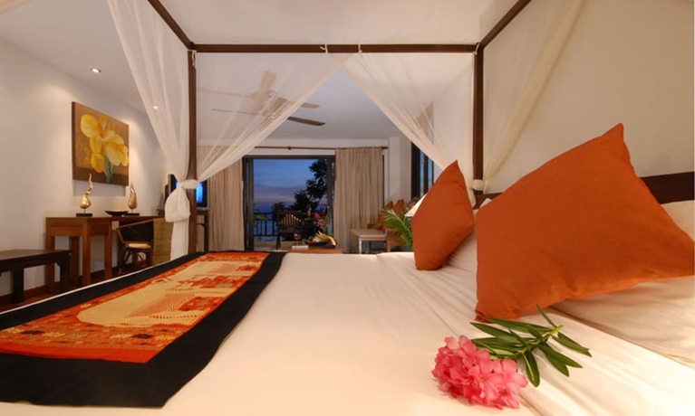 Imagen de la habitación del Hotel Cinnamon Beach Villas. Foto 3