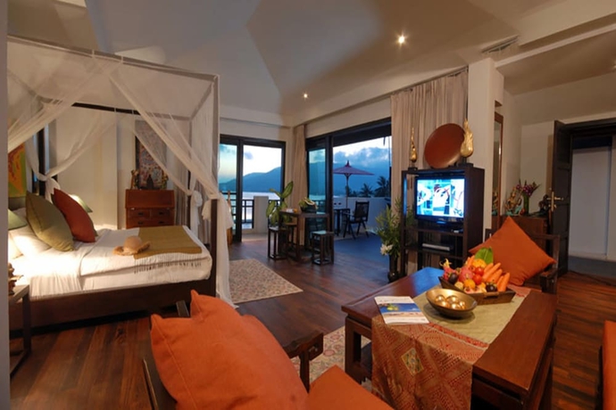 Imagen de la habitación del Hotel Cinnamon Beach Villas. Foto 4
