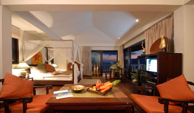 Imagen de la habitación del Hotel Cinnamon Beach Villas. Foto 5