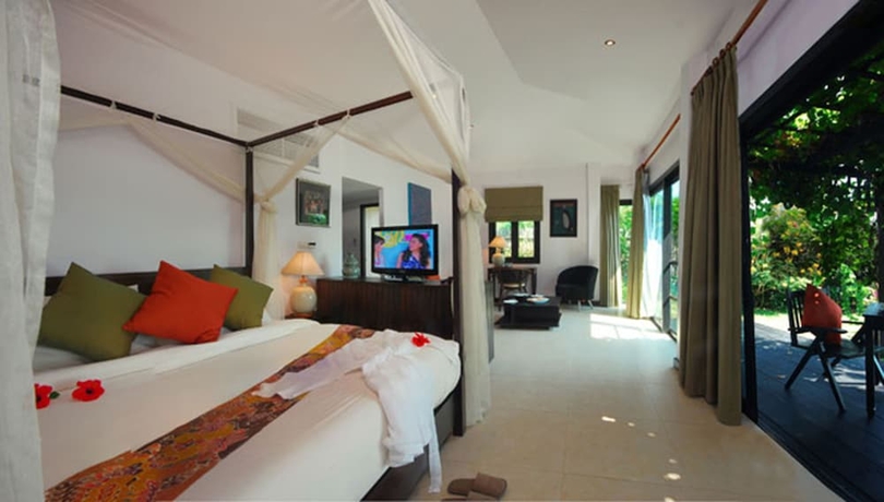 Imagen de la habitación del Hotel Cinnamon Beach Villas. Foto 11