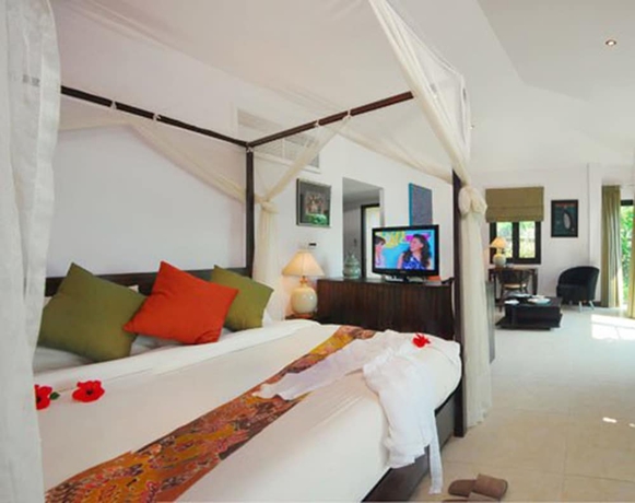 Imagen de la habitación del Hotel Cinnamon Beach Villas. Foto 12