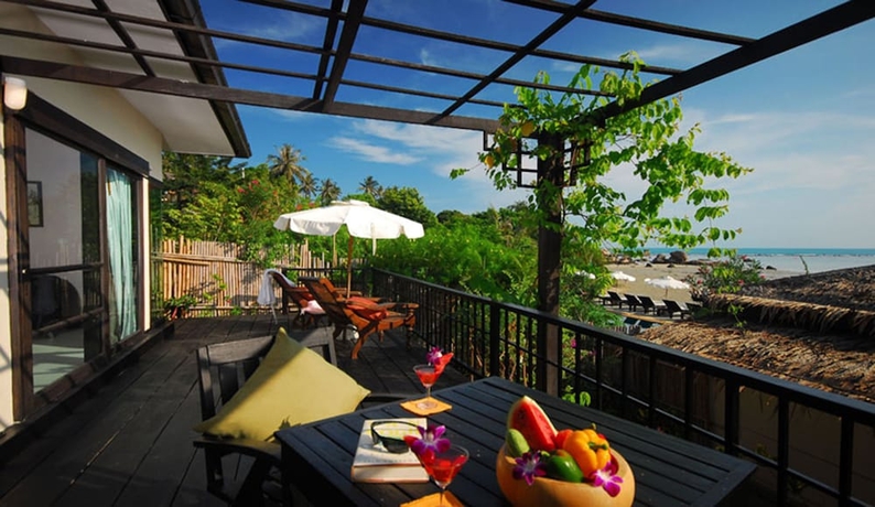 Imagen de la habitación del Hotel Cinnamon Beach Villas. Foto 14