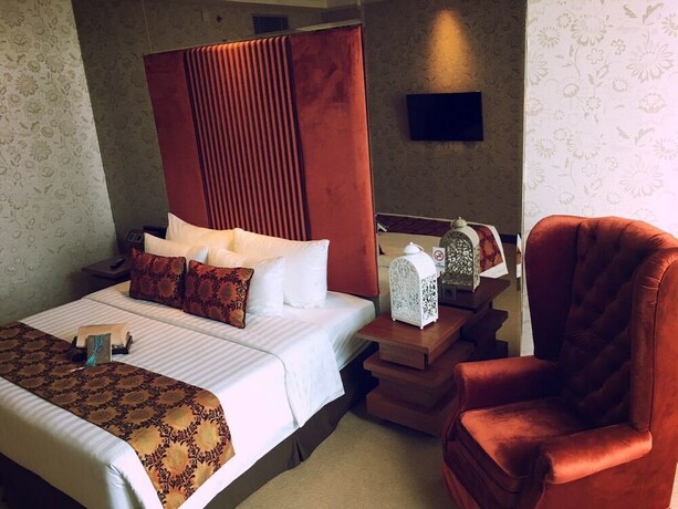 Imagen de la habitación del Hotel Cinnamon Boutique Syariah. Foto 19