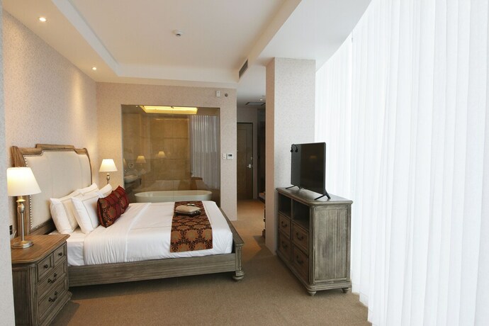 Imagen de la habitación del Hotel Cinnamon Boutique Syariah. Foto 24