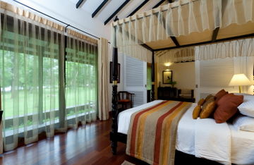 Imagen de la habitación del Hotel Cinnamon Lodge. Foto 4