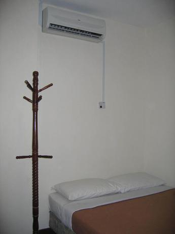 Imagen de la habitación del Hotel Cintamani Travellers Lodge. Foto 7