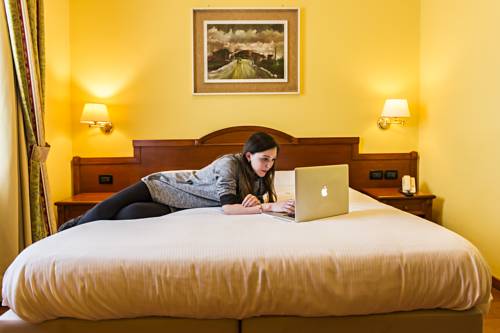 Imagen de la habitación del Hotel Cinzia. Foto 10