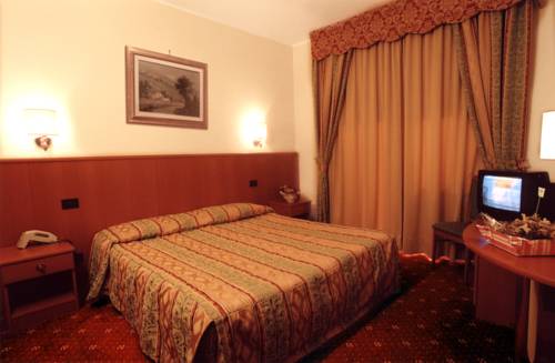 Imagen de la habitación del Hotel Cinzia. Foto 14