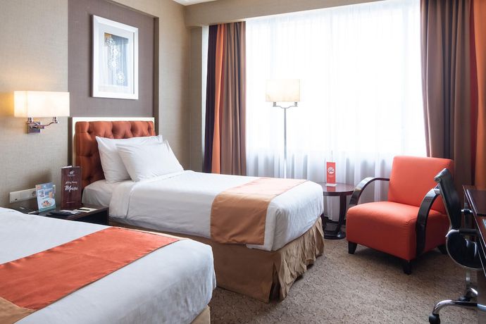 Imagen de la habitación del Hotel Ciputra Semarang. Foto 6