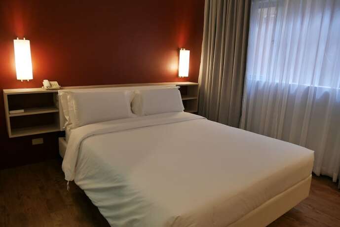 Imagen de la habitación del Hotel Circle Inn And Suites Bacolod. Foto 15