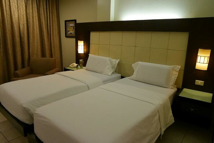 Imagen de la habitación del Hotel Circle Inn And Suites Bacolod. Foto 17