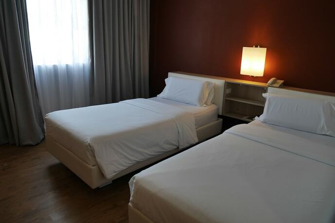 Imagen de la habitación del Hotel Circle Inn And Suites Bacolod. Foto 19