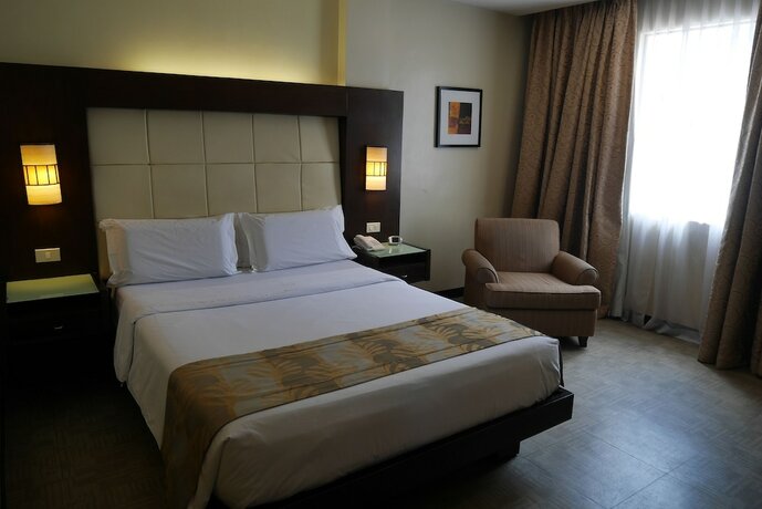 Imagen de la habitación del Hotel Circle Inn And Suites Bacolod. Foto 22