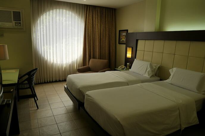 Imagen de la habitación del Hotel Circle Inn And Suites Bacolod. Foto 24