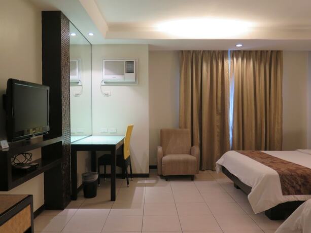 Imagen de la habitación del Hotel Circle Inn - Iloilo City Center. Foto 16