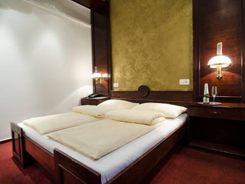 Imagen de la habitación del Hotel Cirman Rooms. Foto 2