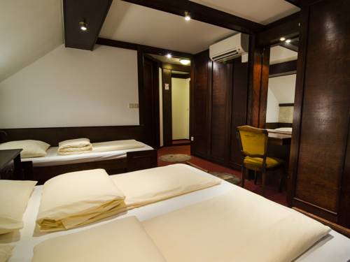 Imagen de la habitación del Hotel Cirman Rooms. Foto 6