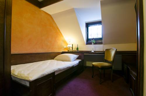 Imagen de la habitación del Hotel Cirman Rooms. Foto 11