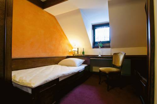 Imagen de la habitación del Hotel Cirman Rooms. Foto 13