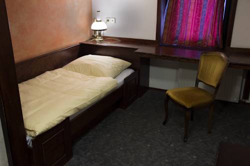 Imagen de la habitación del Hotel Cirman Rooms. Foto 15