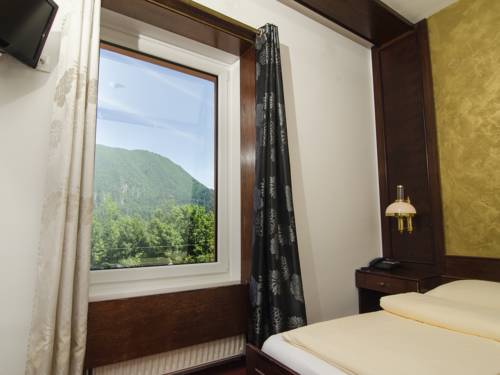 Imagen de la habitación del Hotel Cirman Rooms. Foto 16