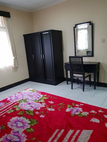 Imagen de la habitación del Hotel Cisarua Indah Cottage. Foto 20