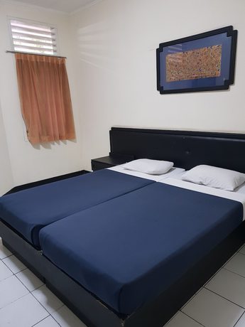 Imagen de la habitación del Hotel Cisarua Indah. Foto 9