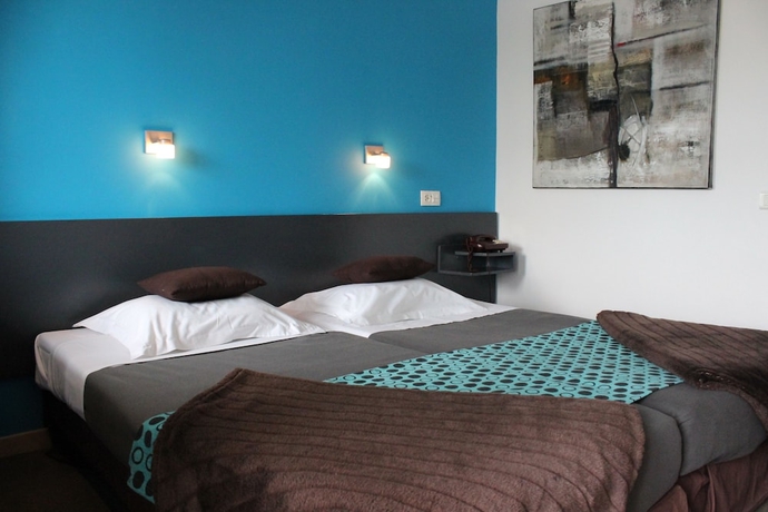 Imagen de la habitación del Hotel Cit'Hotel L'Oasis d'Avignon. Foto 11