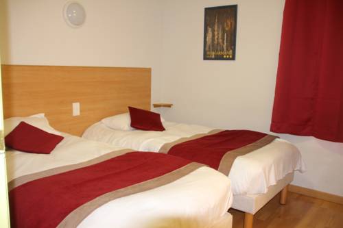 Imagen de la habitación del Hotel Cit'Hotel Restaurant Bowling de Millau. Foto 4