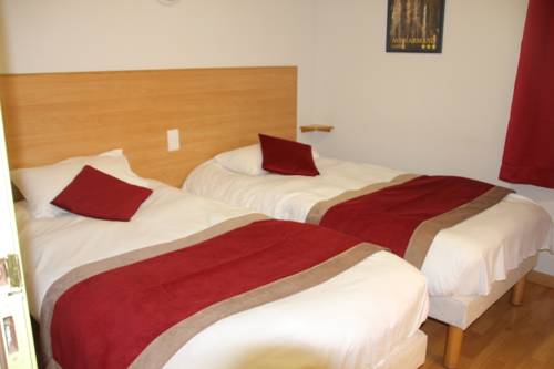 Imagen de la habitación del Hotel Cit'Hotel Restaurant Bowling de Millau. Foto 11