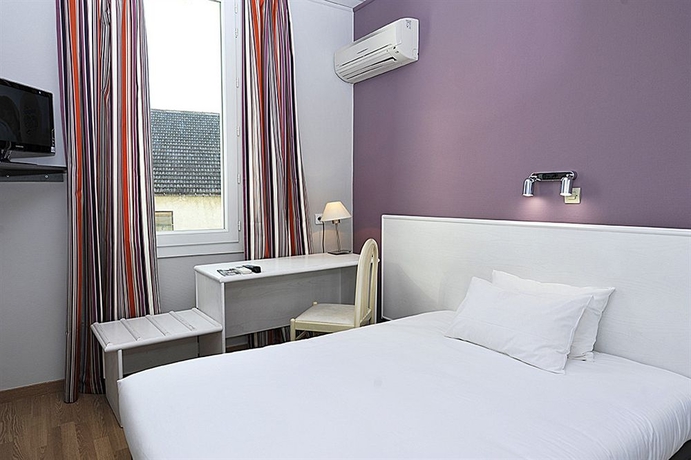 Imagen de la habitación del Hotel Cit'Hotel le Louvre. Foto 4