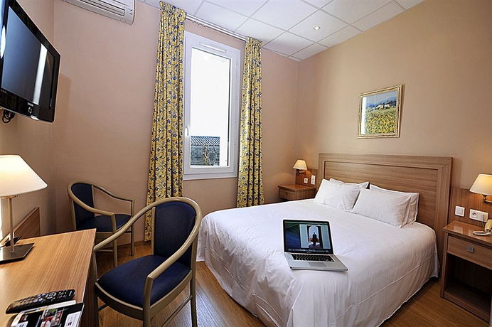 Imagen de la habitación del Hotel Cit'Hotel le Louvre. Foto 6