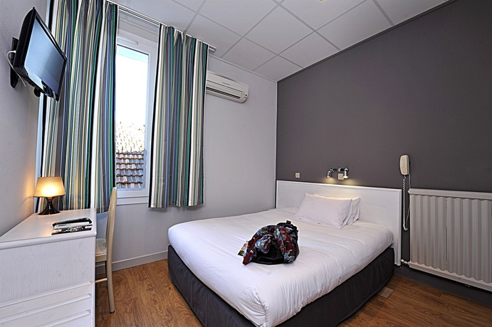 Imagen de la habitación del Hotel Cit'Hotel le Louvre. Foto 7