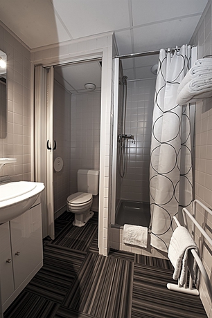 Imagen de la habitación del Hotel Cit'Hotel le Louvre. Foto 8