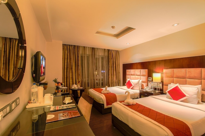 Imagen de la habitación del Hotel Citadel Sarovar Portico Bengaluru. Foto 9