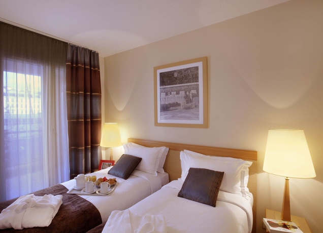 Imagen de la habitación del Hotel Citadines Bastille Gare De Lyon. Foto 7