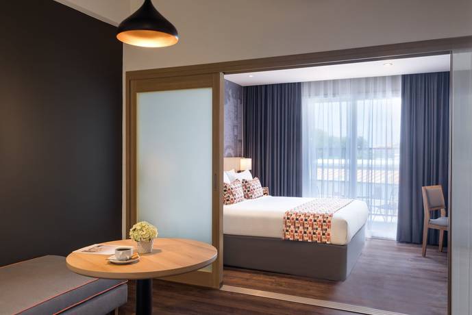 Imagen de la habitación del Hotel Citadines Central Binh Duong. Foto 5