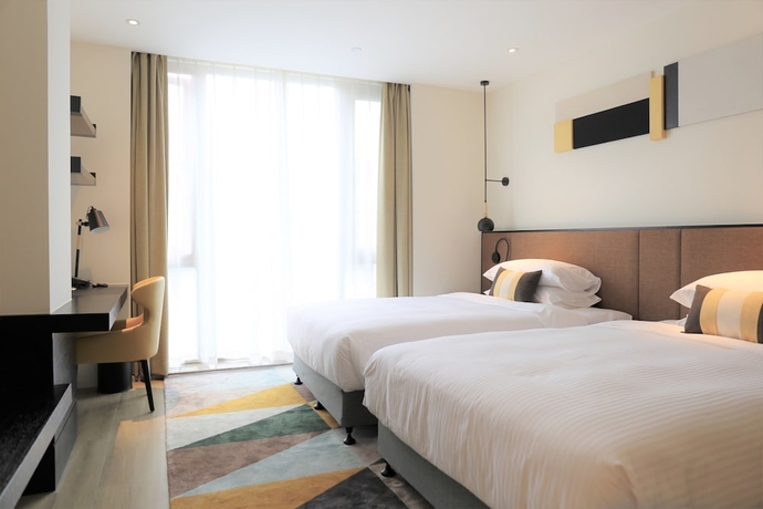 Imagen de la habitación del Hotel Citadines Gaoke Liangjiang Chongqing. Foto 6