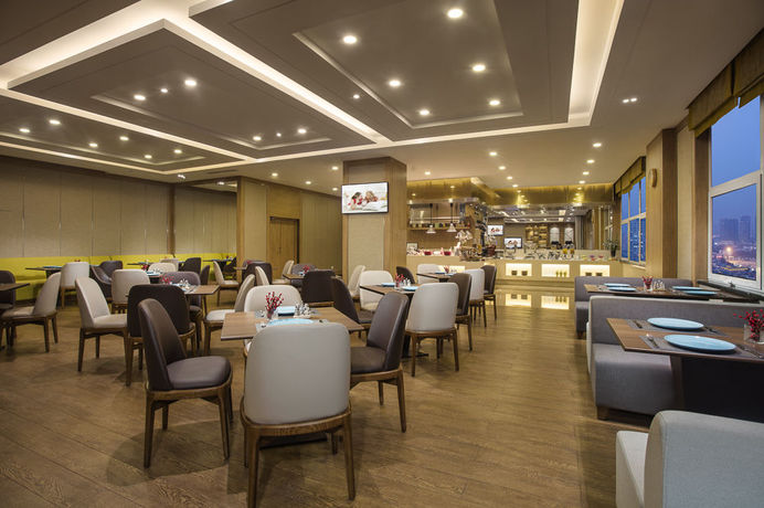 Imagen del bar/restaurante del Hotel Citadines Gugeng Dalian. Foto 3