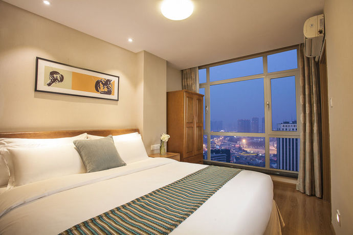 Imagen de la habitación del Hotel Citadines Gugeng Dalian. Foto 11
