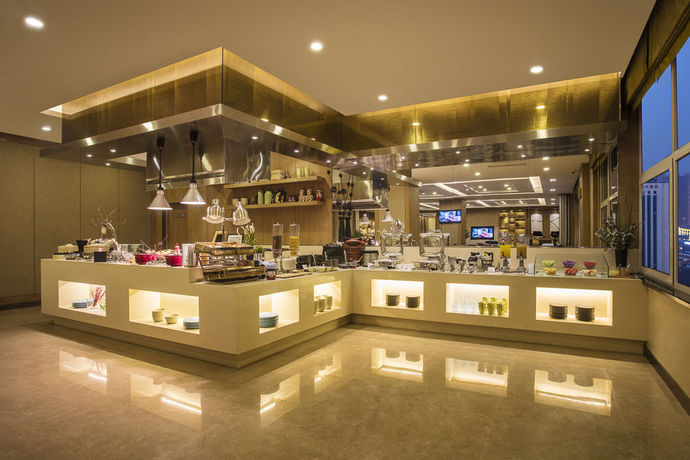 Imagen del bar/restaurante del Hotel Citadines Gugeng Dalian. Foto 5
