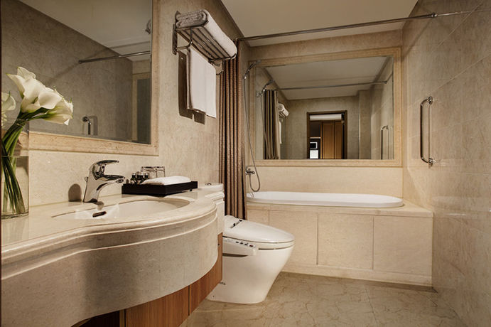 Imagen de la habitación del Hotel Citadines Gugeng Dalian. Foto 16