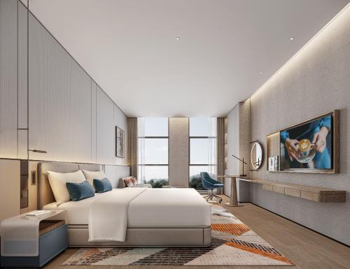 Imagen de la habitación del Hotel Citadines Jinqiao Building Yantai. Foto 18