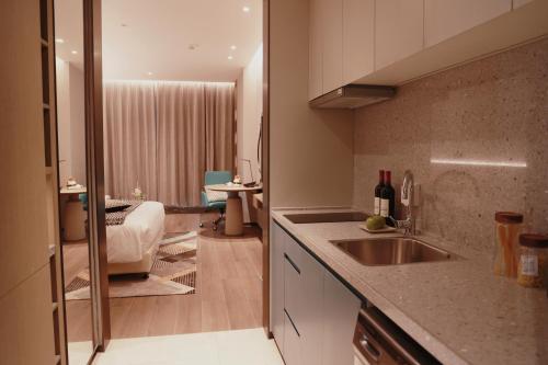 Imagen general del Hotel Citadines Jinqiao Building Yantai. Foto 5