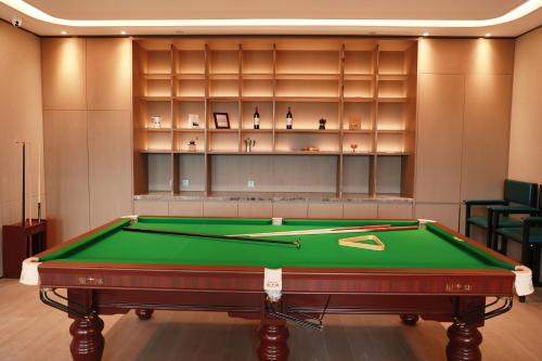 Imagen general del Hotel Citadines Jinqiao Building Yantai. Foto 11