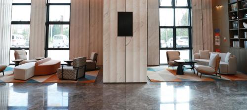 Imagen general del Hotel Citadines Jinqiao Building Yantai. Foto 13