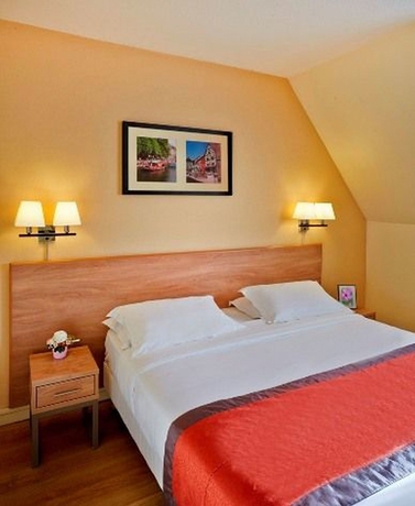 Imagen de la habitación del Hotel Citadines Kléber Strasbourg. Foto 7