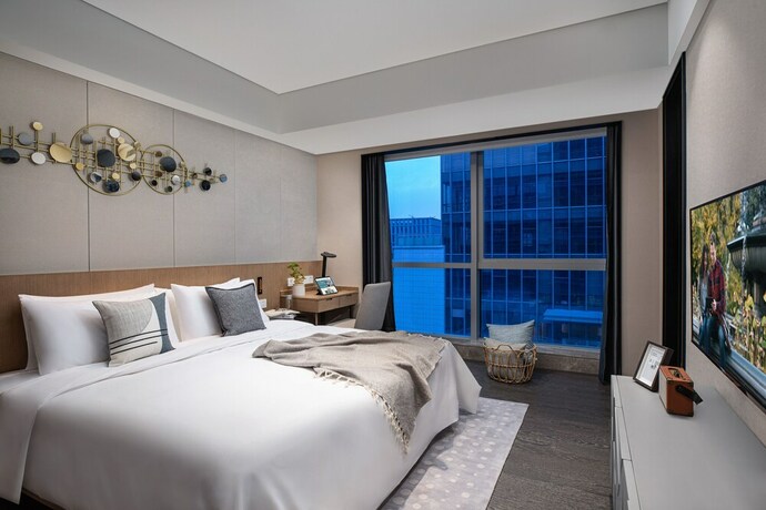 Imagen de los interiores del Hotel Citadines New District Wuxi. Foto 28