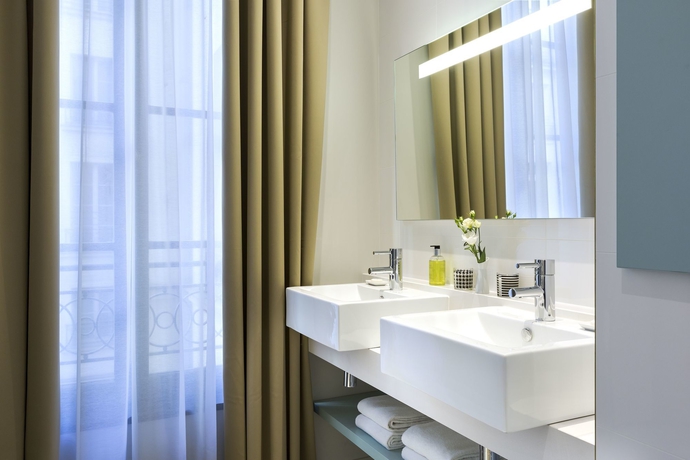 Imagen de la habitación del Hotel Citadines Opéra Paris. Foto 2